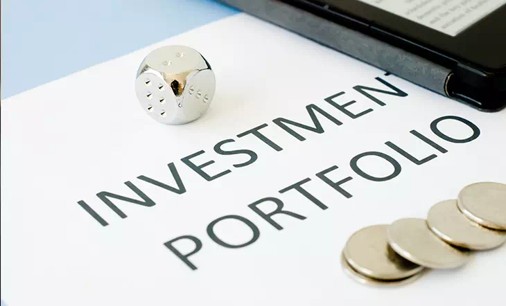 Investment portfolio documents and financial charts